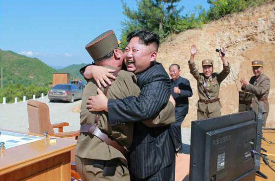  Kim Jong-un is all smiles after a missile launch