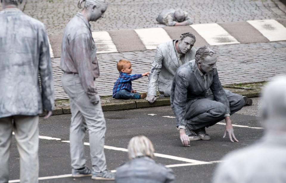 One playful child was seen tugging the sleeve of one of the protesters 