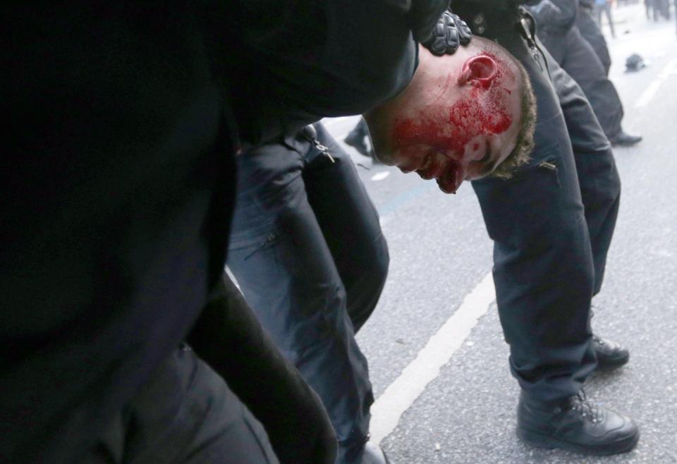 An activist was seen being taken away by police