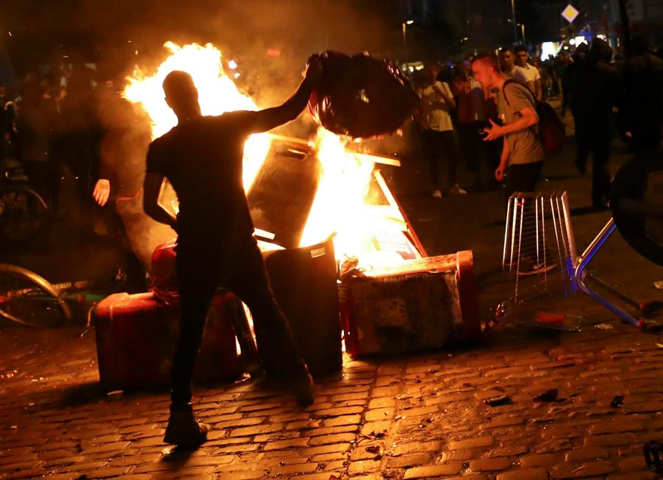 Protesters burn waste close to 'Rote Flora' building ahead of the G20 summit