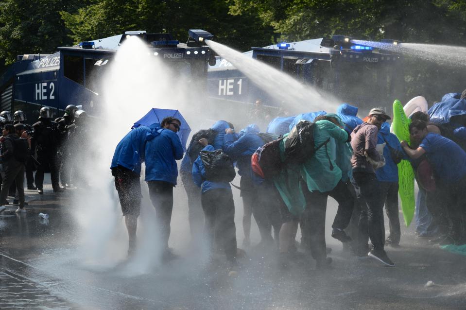  Water canons have been fired at demonstrators ahead of the G20 summit in Hamburg, Germany