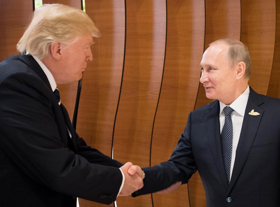  The firebrand property tycoon 'dominated' the Kremlin strongman with a double handed first pump