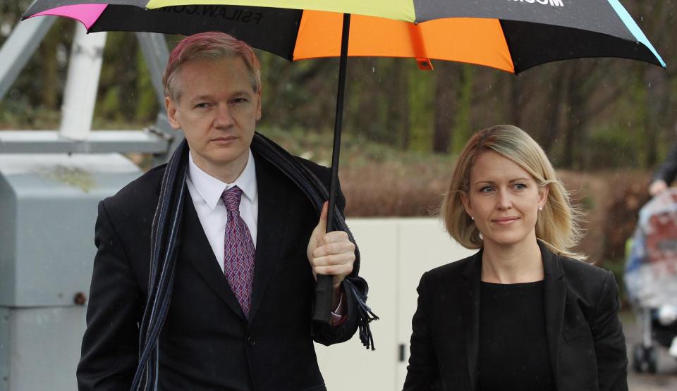  The lawyer pictured with fellow Aussie Assange outside Belmarsh Magistrates Court on February 11, 2011