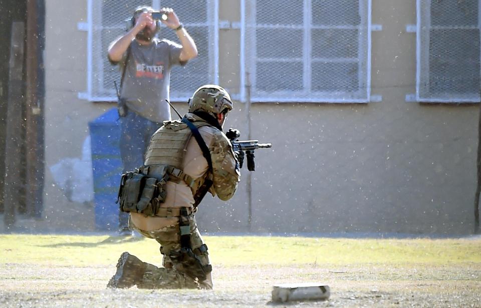  The intense battle scenes saw Michelle's character running for cover as her colleagues fought beside her
