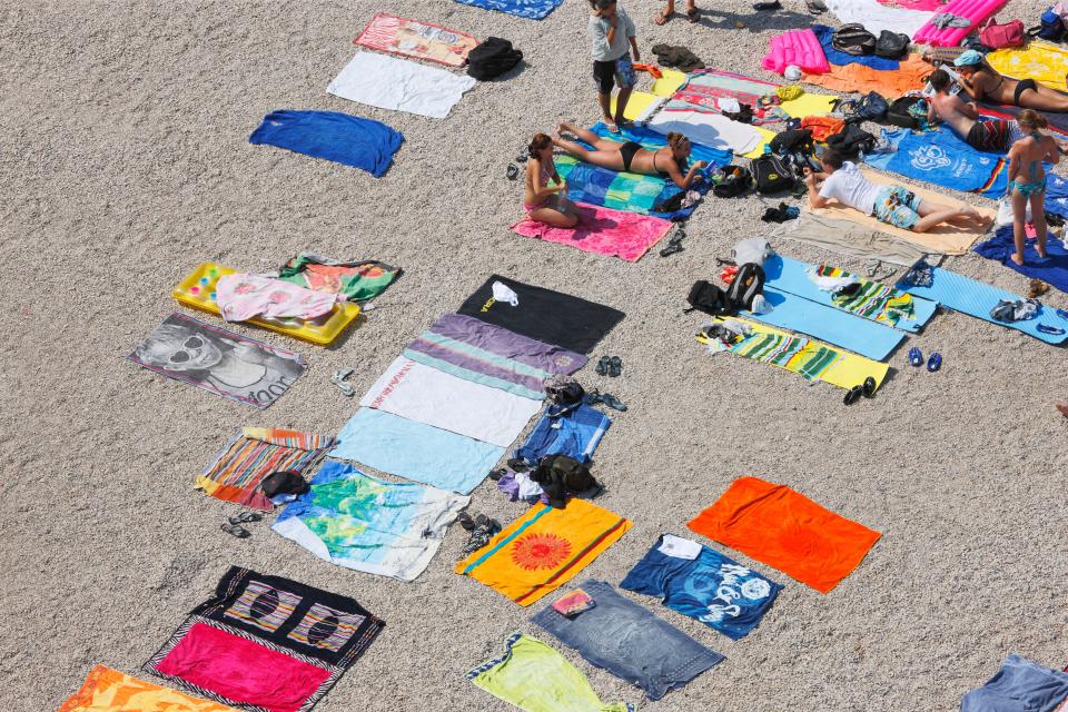 Rows of bare towels laid out on the beach could soon become a thing of the past, thanks to a new law about reserving sunbathing spots 
