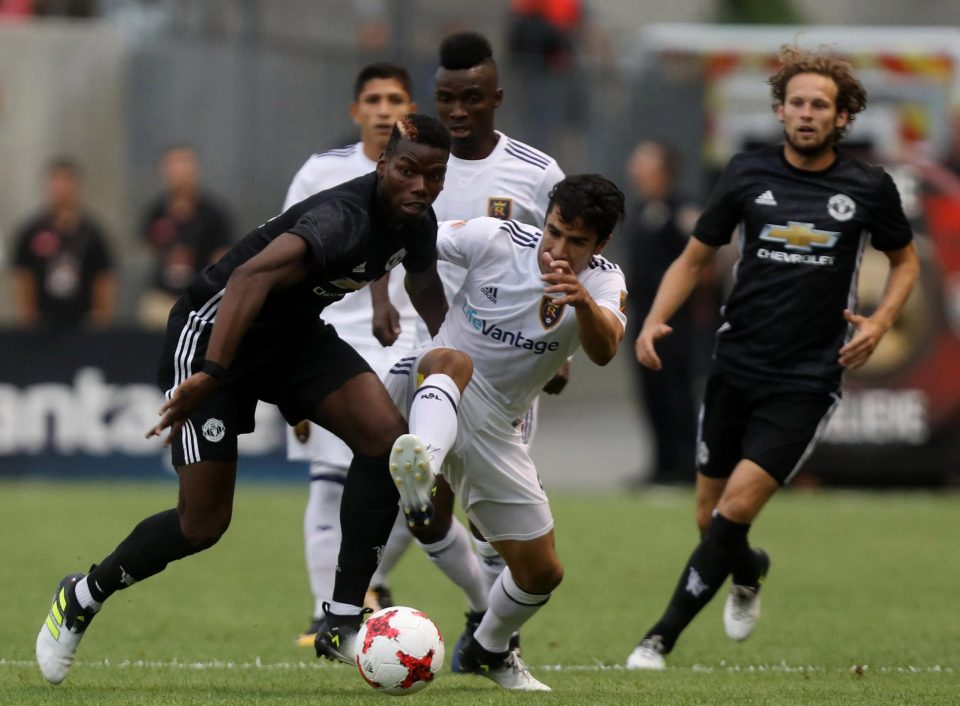 Frenchman Paul Pogba is unlikely to be changing his day job after his basketball cameo with am NBA legend - and is working hard on tour with Utd