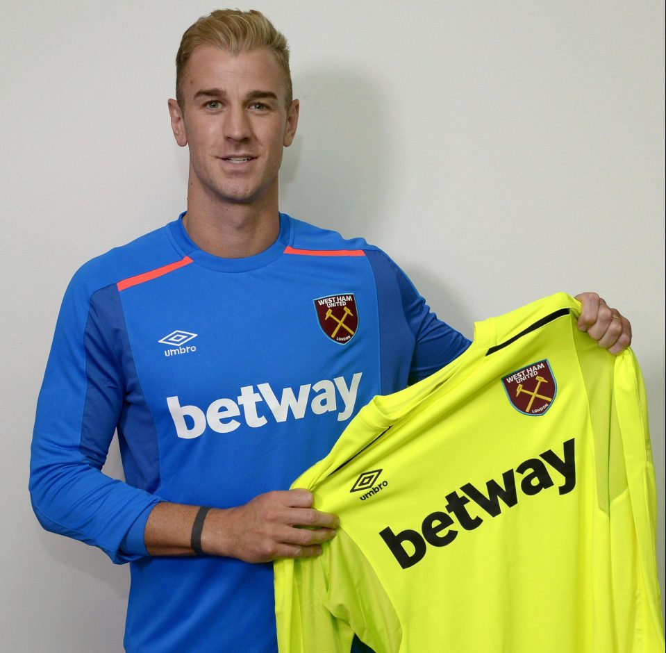 Hart poses with the two keepers jerseys hell be donning next season