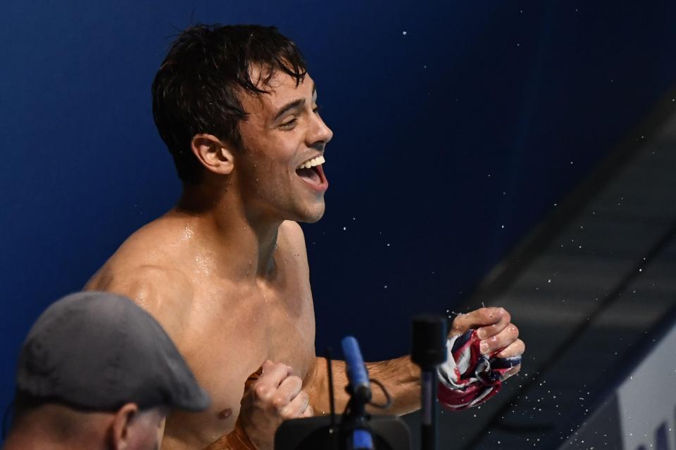  Tom Daley leaped up in celebrated when he saw he had topped the leader board