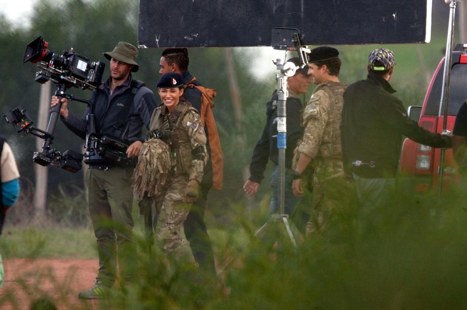 Michelle was beaming as she waited on set between takes, surrounded by the cast and crew
