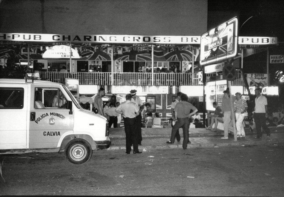 Local police are stationed outside English Pubs in Magaluf in the early 1980s 