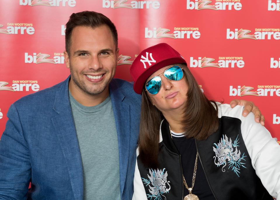 A fully clothed Honey G with Bizarre's Dan Wootton 