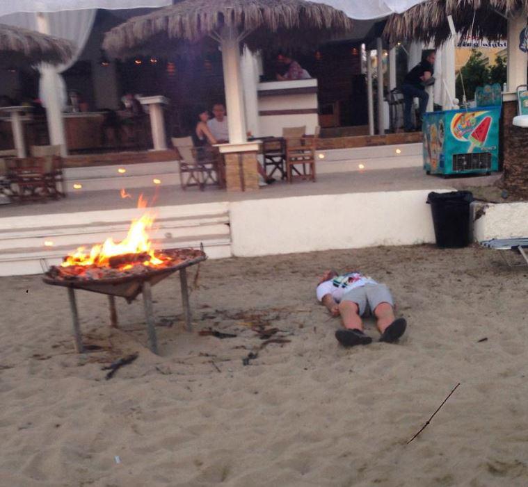  While this lad made sure he kept warm by parking himself next to a roaring fire