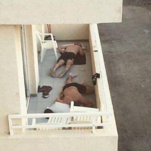 These two lads struggled to make it back to their beds from the hotel balcony