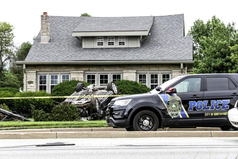  The car had crashed through a fence and flipped