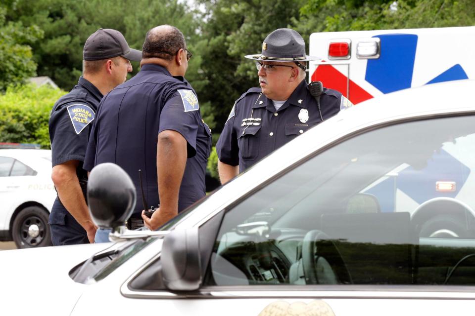  Cops speak at the scene of the crash and fatal shooting in Indiana