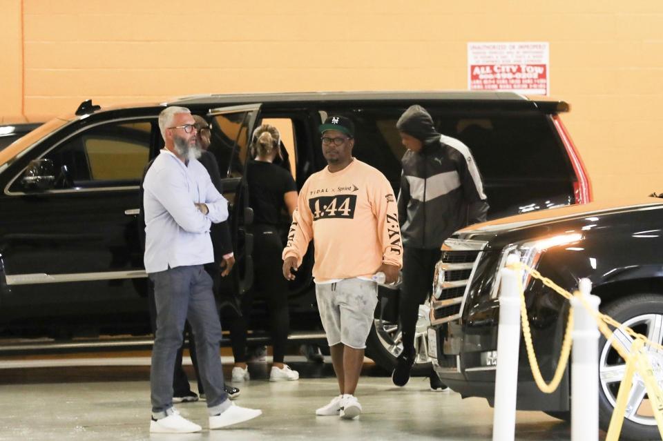  They were accompanied on their gym trip by their assistants