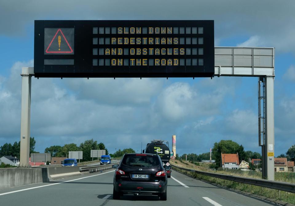  Road signs warn of dangers in the road