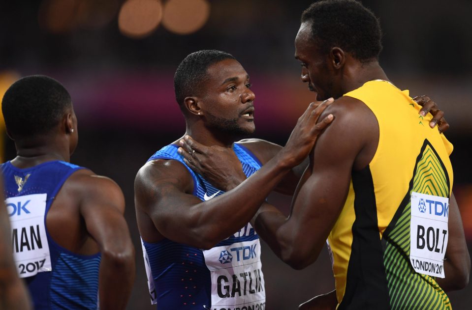 Usain Bolt congratulates world champion Justin Gatlin after his shock win