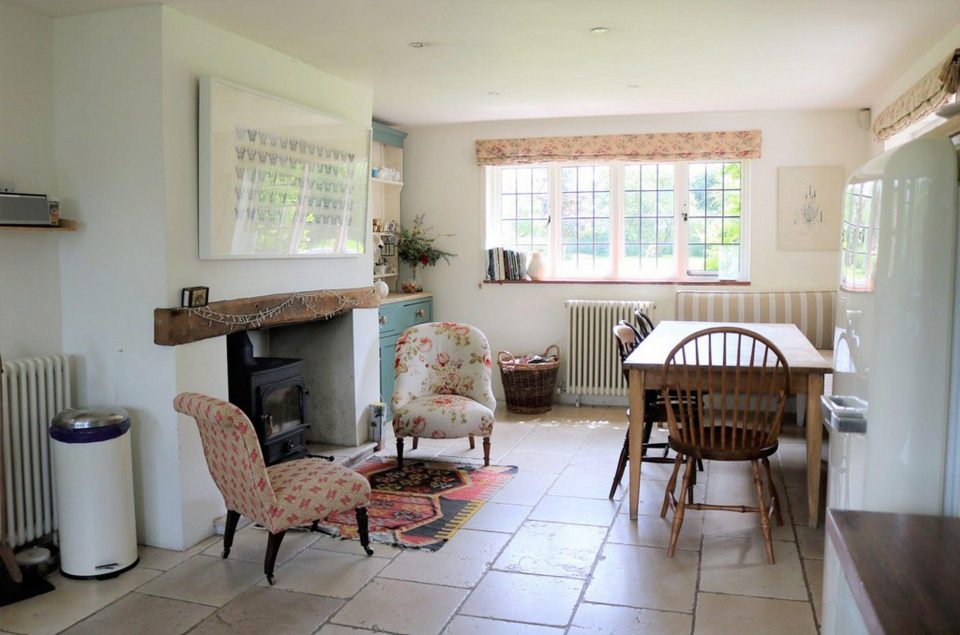  The kitchen has retained its original flagstone floor from the 17th century