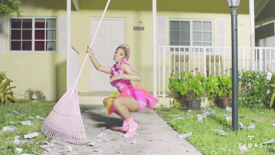  Nicki's outfits in the video are typically colourful