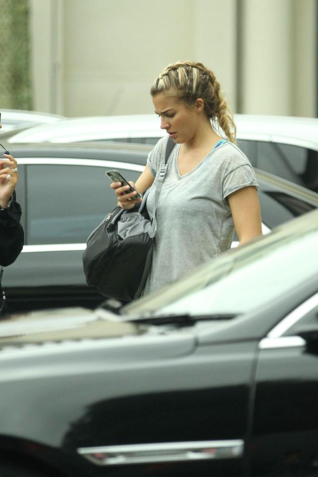  The Emmerdale actress checked her phone outside the venue