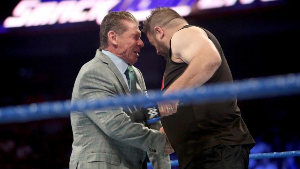  Kevin Owens headbutts the chairman