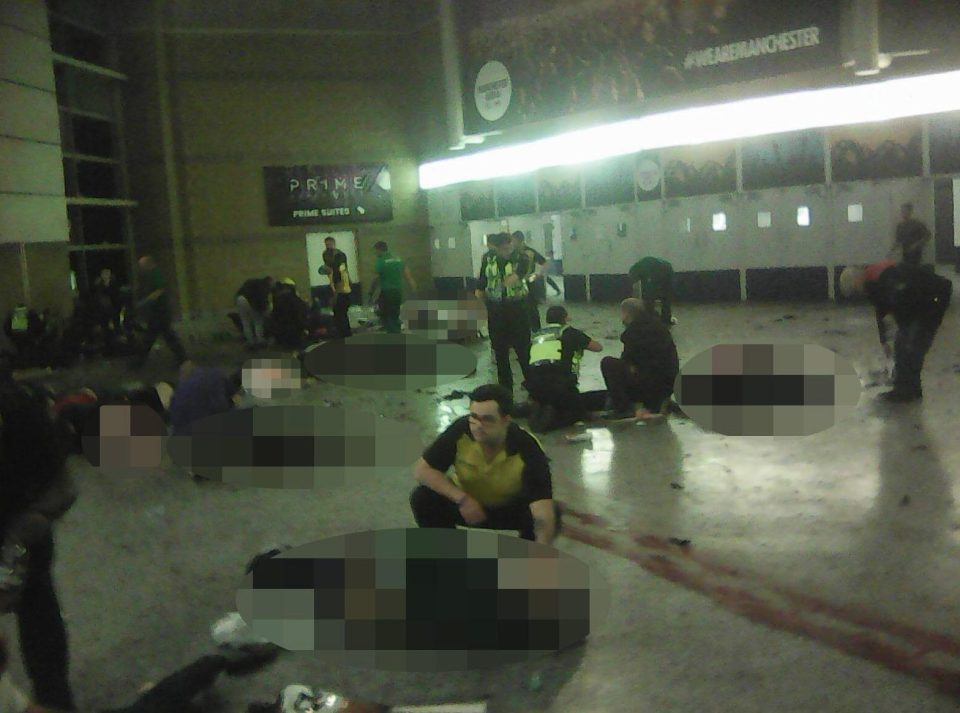 Emergency services work at the scene of the atrocity in the aftermath of the blast