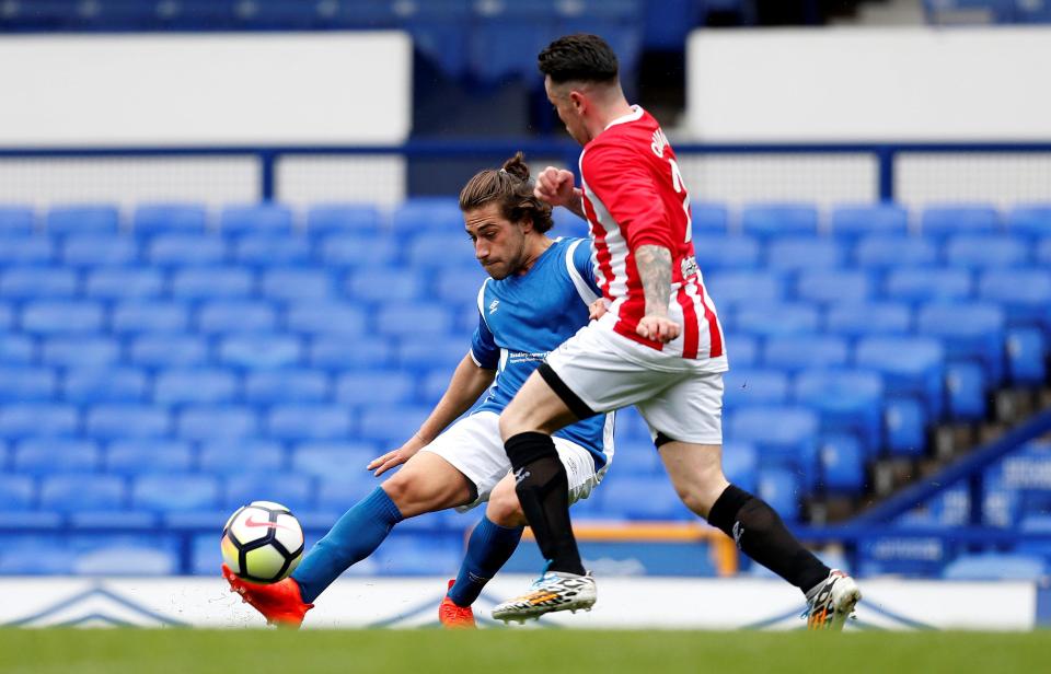 Love Island Star Kem Cetinay cuts inside and fires an effort at goal for the Bradley's Blues