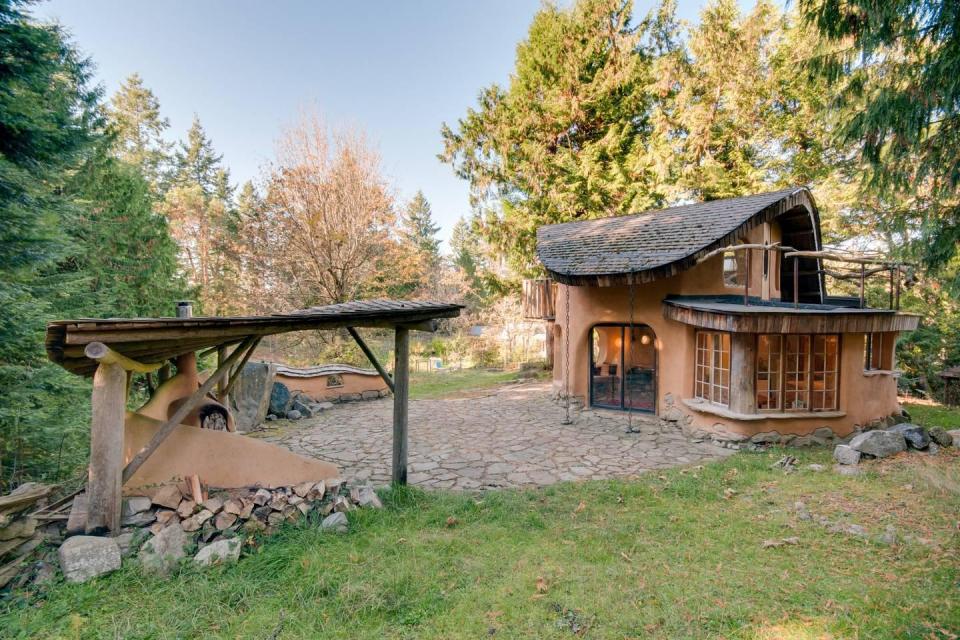  This Canadian Cob cottage is surrounded by fields - which are home to quite a few sheep