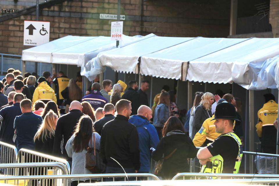 Queues have formed outside the venue where strict security has been put in place