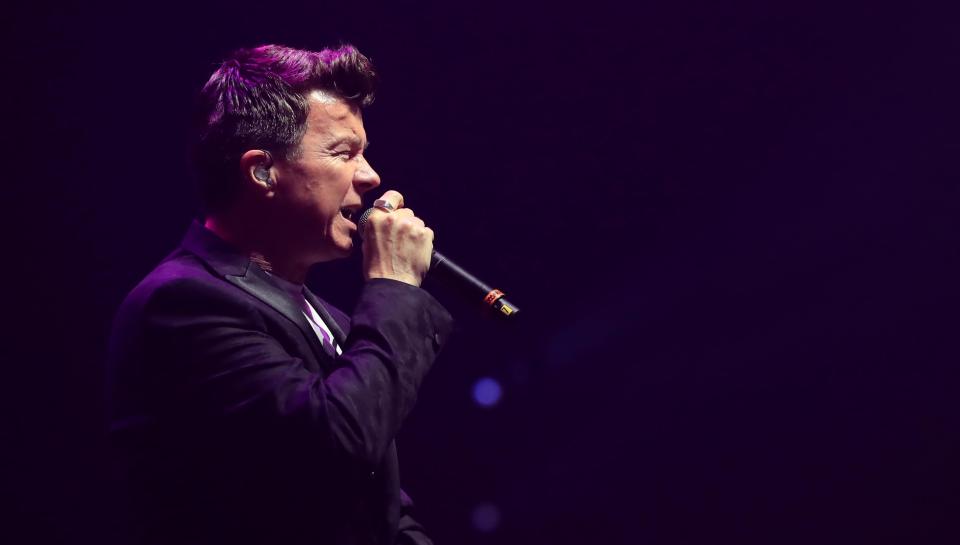 Rick Astley performs during the We Are Manchester benefit concert