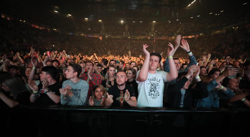 Crowds cheered for a minute after being told to 'show the volume of our love'