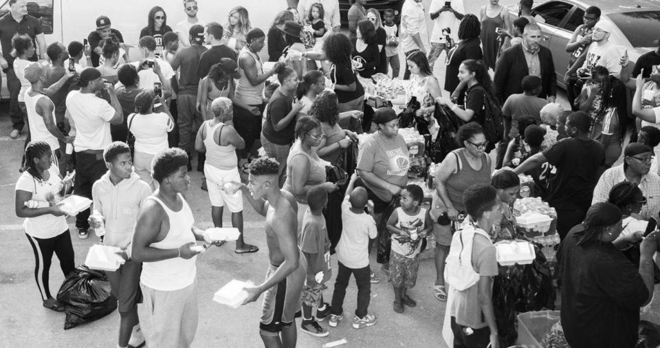  Hundreds of panic-stricken residents queued up for a meal