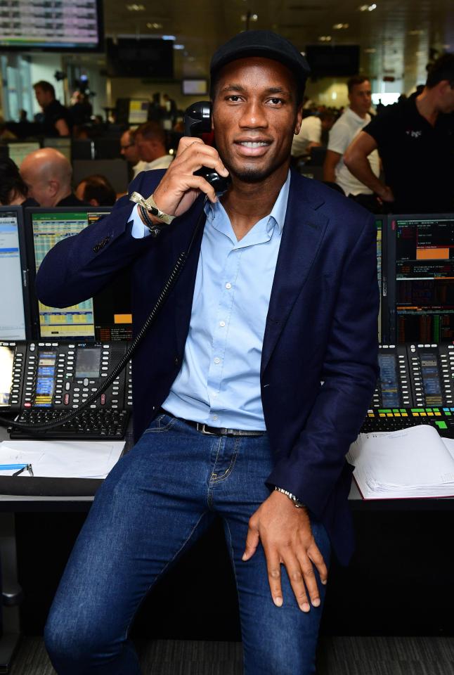  Footballer Didier Drogba cut a cool figure on the trading floor