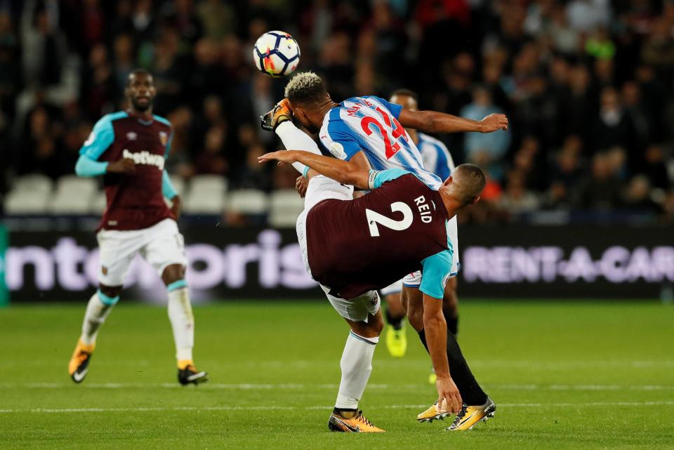  Huddersfield's Steve Mounie took a boot in the face by Winston Reid