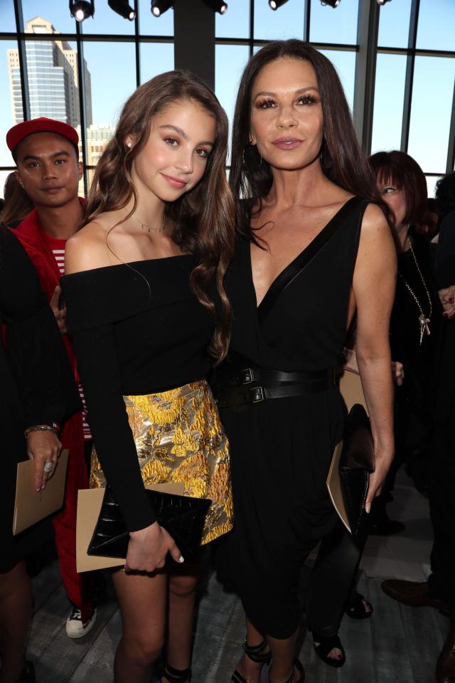  Catherine Zeta-Jones attended the Michael Kors fashion show with her lookalike daughter Carys