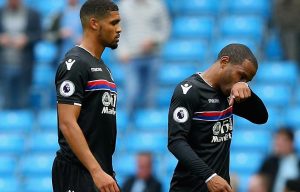 Jason Puncheon and Ruben Loftus-Cheek tropp off after the 5-0 walloping at Manchester City