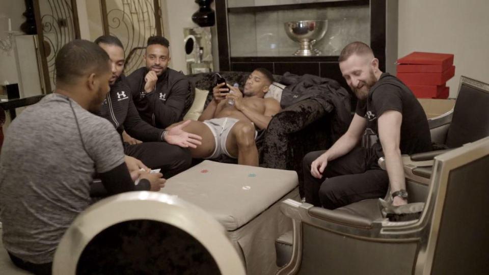  Joshua was also seen flicking through his phone as he friends continued their poker game