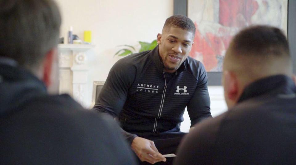  Anthony Joshua plays poker with his entourage during training for Kubrat Pulev