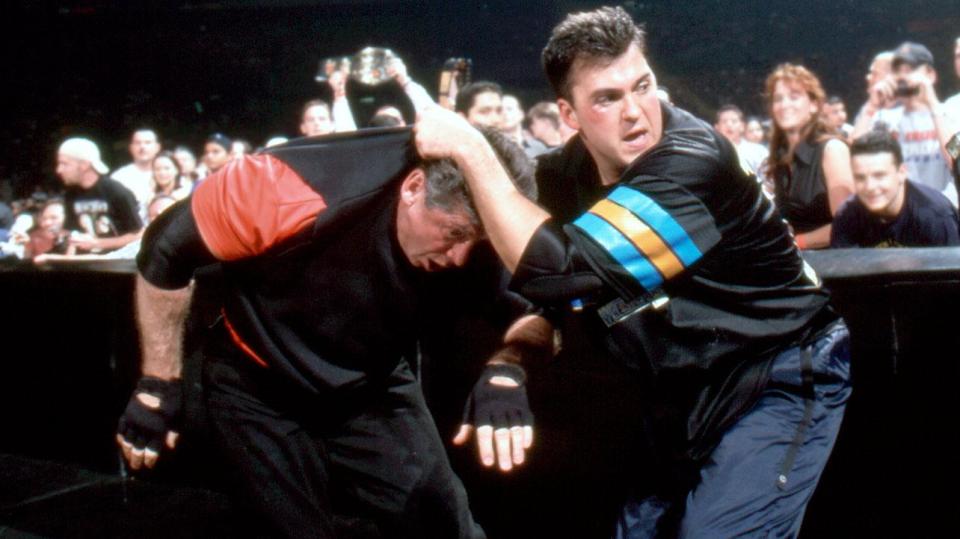  Shane manhandles Vince at WrestleMania X-Seven