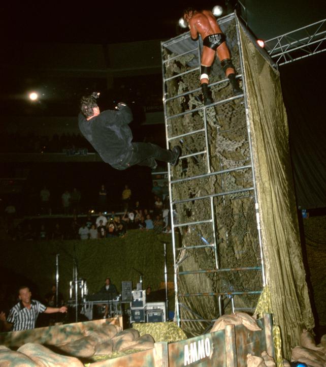  Vince takes a tumble at Armageddon