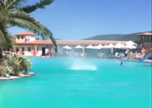  A small twister could be seen on the surface of the hotel pool as swimmers splashed around