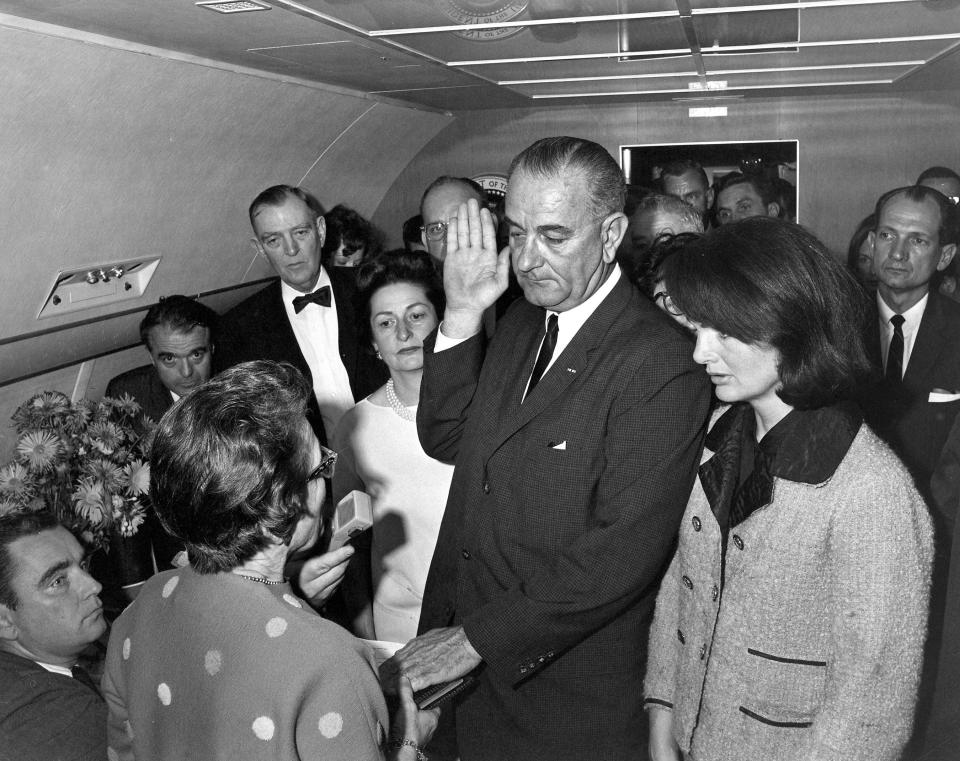 Lyndon B Johnson being sworn in as president 