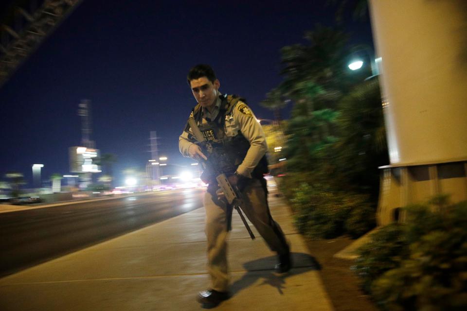  An officer rushes in, heavily armed
