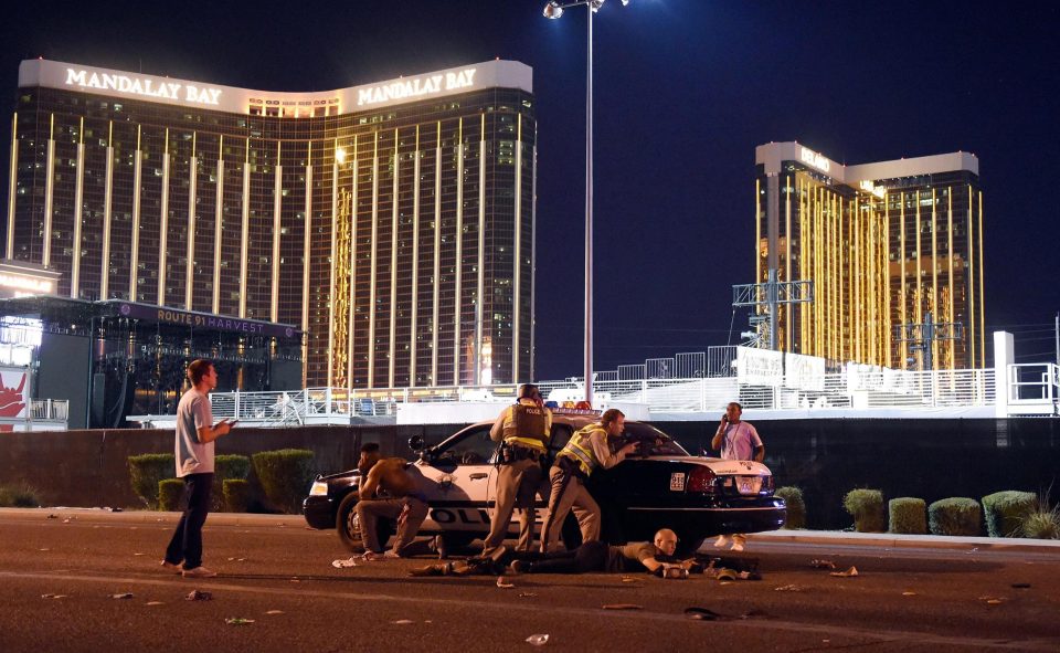 People duck for cover, with videos capturing what appears to be gunshots