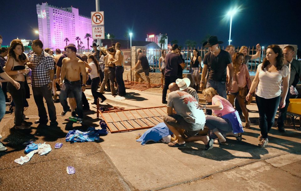 People desperately help a person believed to be injured