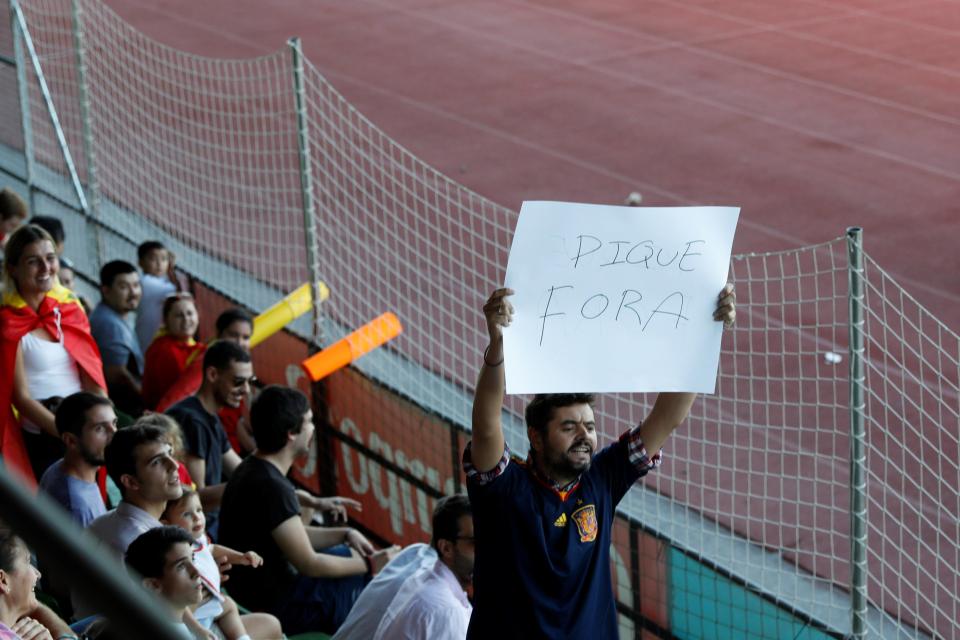  Some fans were protesting against Gerard Pique as he arrived for Spain training