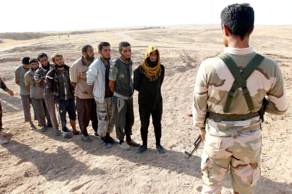  Kurdish Peshmerga forces detain Islamic State militants southwest of Kirkuk, Iraq