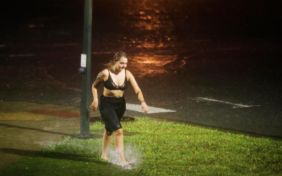  Residents in areas facing heavy winds and storm surges were urged to take precautions