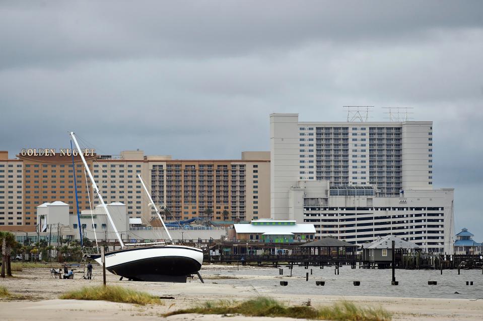  A sail boat is beached near Margaritaville and the Golden Nugget in Biloxi
